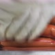 Hands of Operator Stacking Finished Sausages in the Package - VideoHive Item for Sale