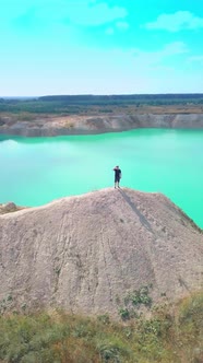 a man descends from the mountain on the chalk quarries.