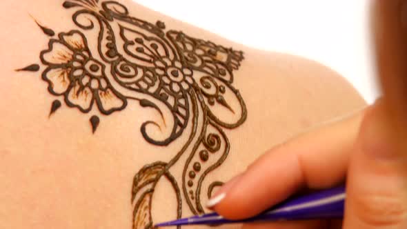 Drawing Process of Henna Mehendi Ornament on Shoulder