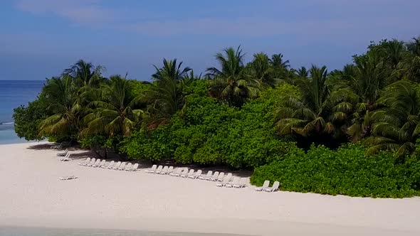 Aerial drone texture of resort beach journey by blue lagoon with sand background