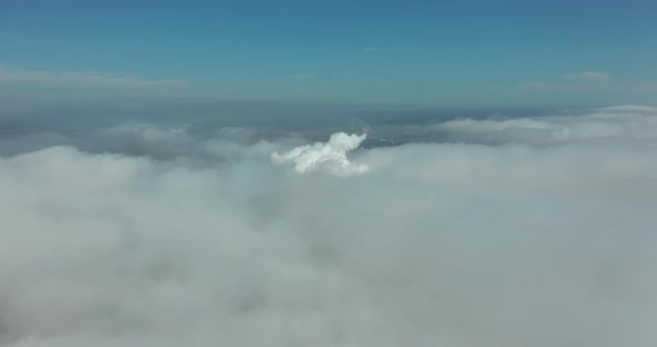 Aerial View. Scenic Aerial View Through Moving White Clouds. Fog.