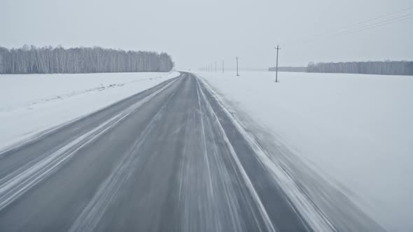 Driving Along Empty Rural Road