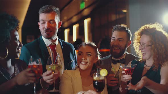 Friends having fun in a cocktail bar