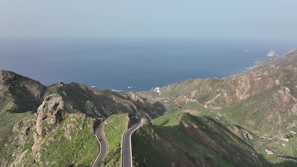 Aerial Drone View of a Wild Touristic Twisty Road in the Green Lush Mountains Along the Atlantic