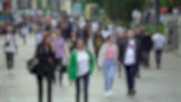 Silhouettes of People Walking in a Crowd Slow Motion