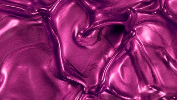 Super Slow Motion Shot of Splashing Pink Metallic Color Background at 1000Fps