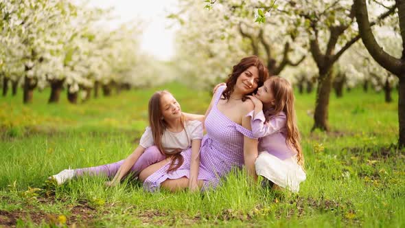 A Family in a Blossoming Spring Garden
