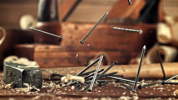 Nails Fall on the Table with Shavings