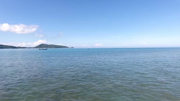 Aerial Flying On Blue Sea