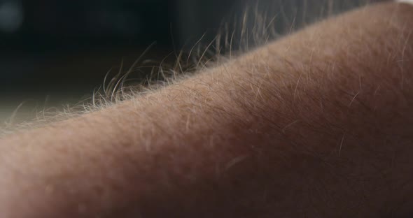 Arm hair rising slow motion