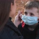 Mom Takes Off the Medical Mask From Her Son's Face - VideoHive Item for Sale