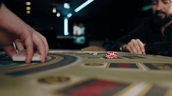 People Playing Poker in Casino