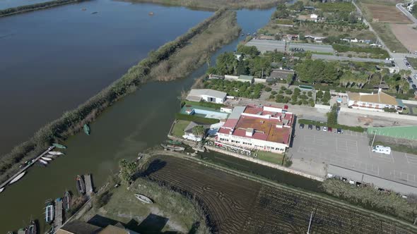 Beautiful Aerial Drone View of Rows Agricultural Field and Water Irrigation Submerged in Water with