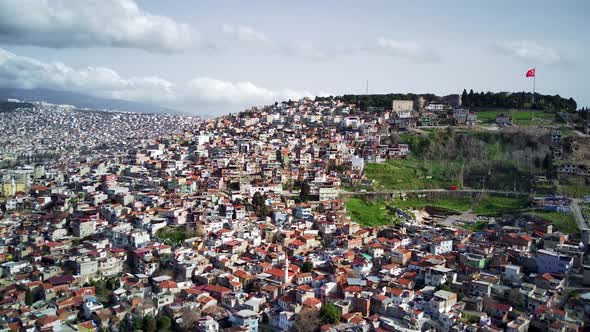 Drone view on poverty slum district and muslim mosque