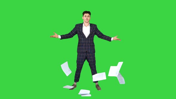 Businessman Throwing Papers in the Air and Dancing on a Green Screen, Chroma Key