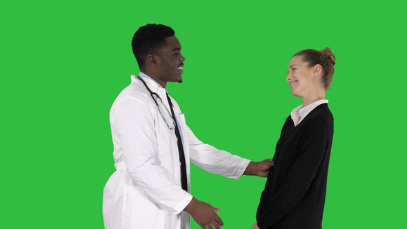 Doctor telling good news to a patient on a Green Screen