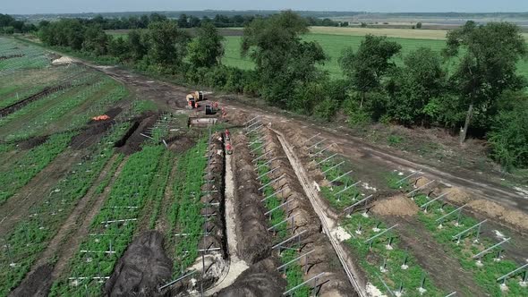 Drone Footage of a Construction Site of Solar Power Station in the Field