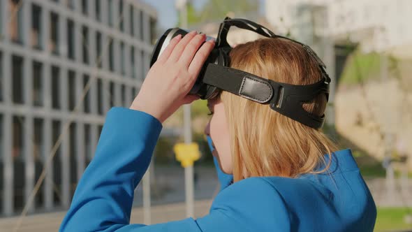 Woman Wearing Virtual Reality Headset and Start to Use Virtual Interface