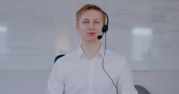 Helpdesk Support Man Talking on Headset Video Conference