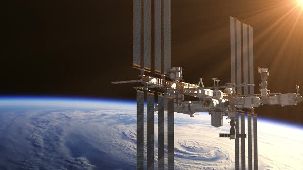 Flight Of International Space Station In The Rays Of Sun