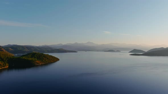 Aerial Footage of the Picturesque Bay of the Many Islands Near Marmaris at Sunrise Lone Sailing