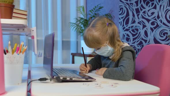 Cute Kid Pupil Watching Video Lesson Studying Using Digital Laptop Computer Doing Homework Online