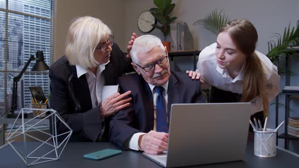 Elderly Mature Freelancer Man Crosses Fingers for Good Luck Prays but Losing in Office Bankruptcy