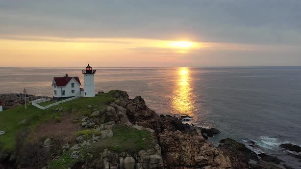 Nubble Lighthouse in Maine at Sunrise Drone Video