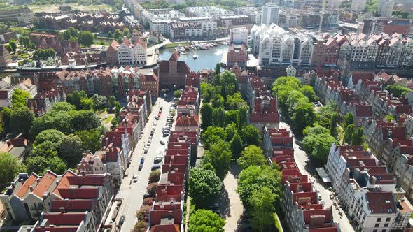 Aerial view of Gdansk old town in summer scenery in the afternoon, Poland top-down view, side motion