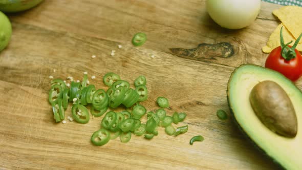 Cut a Green and Hot Pepper Into Small Slices