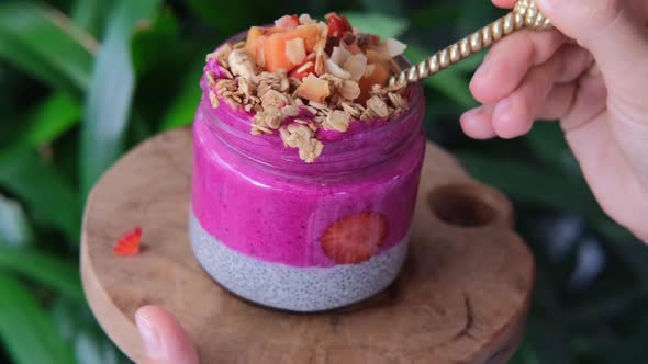 Close Up of Extremely Healthy Detox Breakfast Meal Chia Pudding with Berries Smoothie and Granola