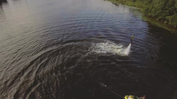 Fly Board Rider on the River