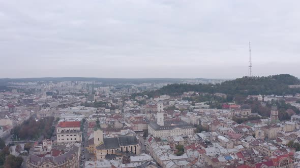 Aerial Drone Video of European City Lviv Ukraine Rynok Square Central Town Hall Dominican Church