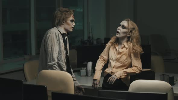 Mindless Zombies Having Conversation in Dark Office
