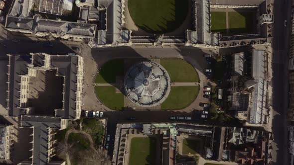 Top down rising drone shot over Bodleian Library Radcliffe camera Dome Oxford