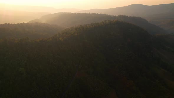 4K Aerial view over beautiful mountains. beautiful sunset over high mountains