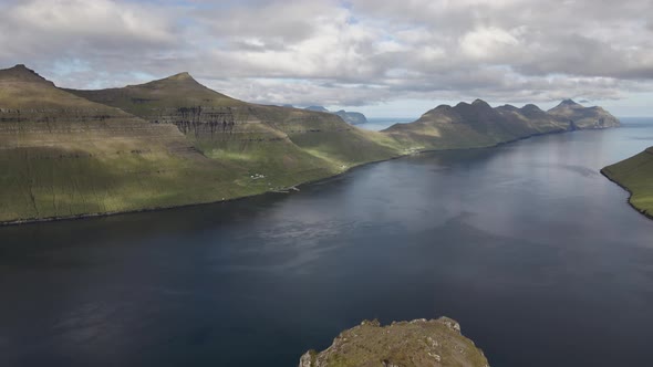 Drone Over Hikers On Klakkur With Mountains And Sea Beyond