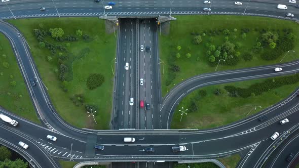 Aerial View Flying Over of Loaded Cars with Traffic Jam at Rush Hour on Highway with Bridge