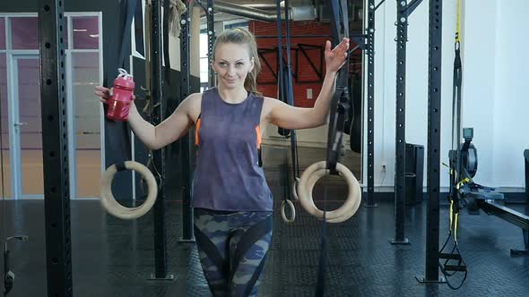 Fit Girl Entering a Fitness Club and Preparing for the Training