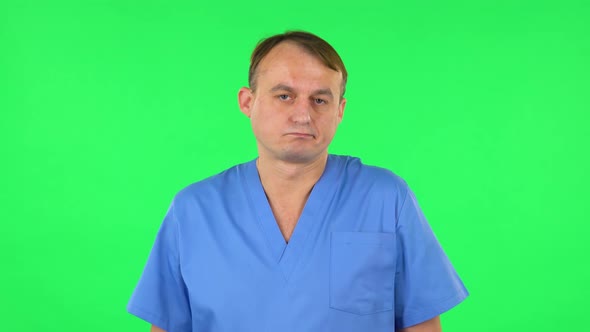 Upset Man Disappointed Looks at Camera and Shrugs, Green Screen