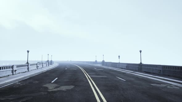 View of the Bridge Over the River in Fog alt