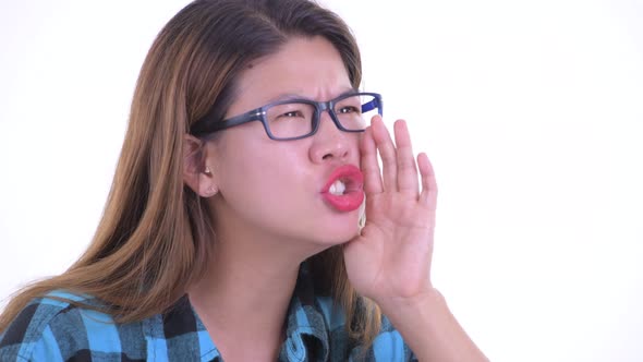 Face of Stressed Young Asian Hipster Woman Getting Bad News