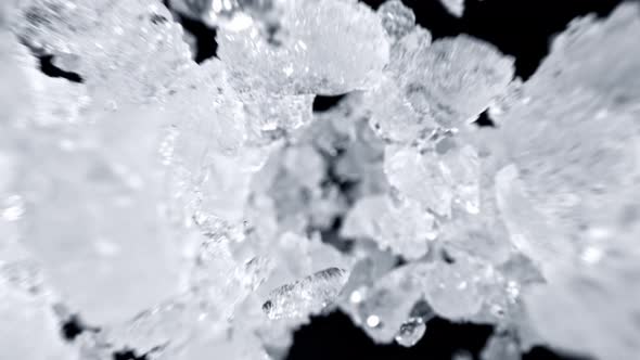 Super Slow Motion Shot of Crushed Ice Flying Towards Camera at 1000Fps