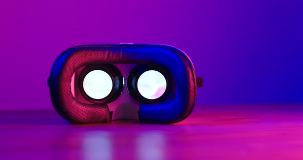 VR device with purple and pink light