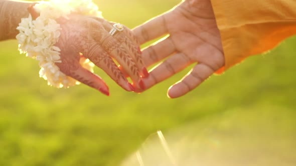 India. Male And Female Hands. They Touch Each Other.