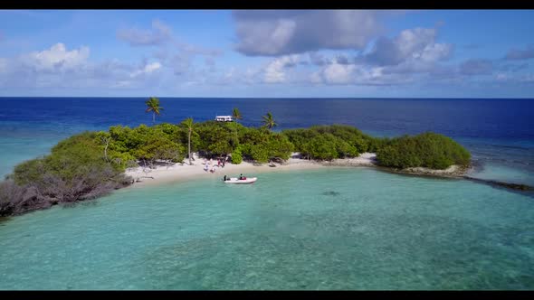 Aerial nature of marine island beach trip by transparent sea and white sandy background of a dayout 