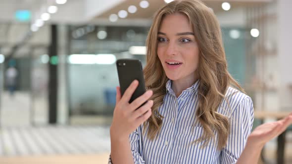 Portrait of Businesswoman Doing Video Call on Smartphone