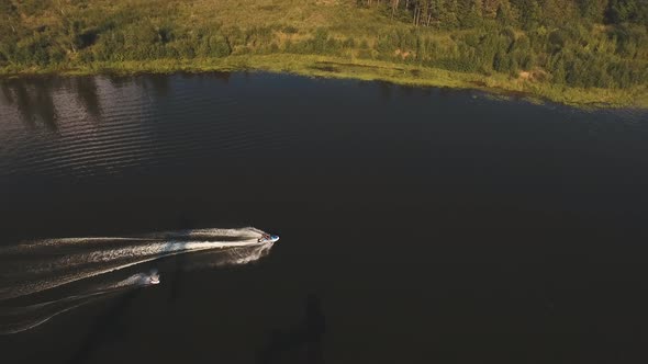 Wakeboarder Surfing on the River