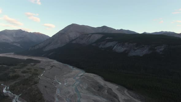 Beautiful View of Scenic Road By Glacial River at Sunset