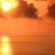 Sun Setting Through Clouds with Ocean Reflection and Islands Timelapse - VideoHive Item for Sale